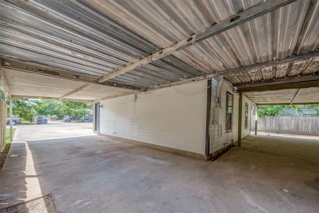garage featuring fence