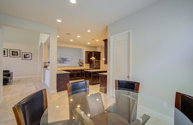 view of tiled dining space