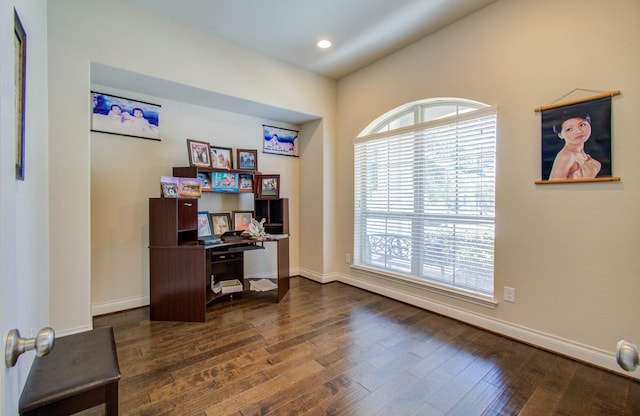 office space with dark hardwood / wood-style floors