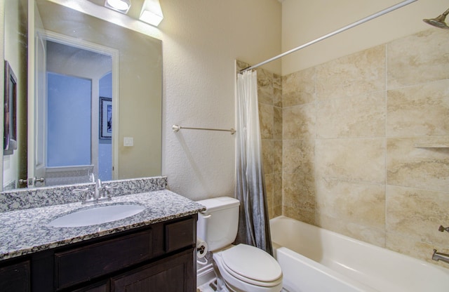 full bathroom with toilet, shower / bath combo with shower curtain, and vanity