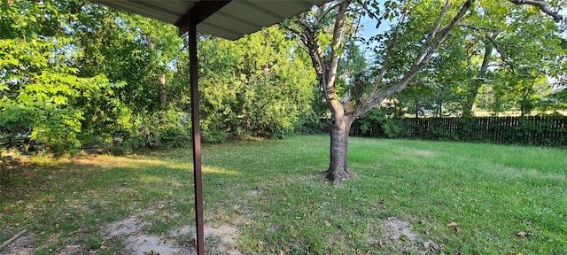 view of yard with fence