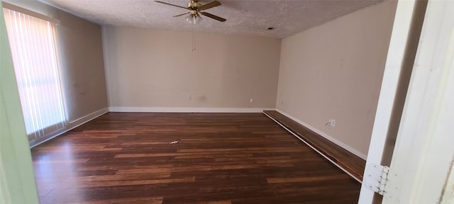 unfurnished room featuring a textured ceiling, plenty of natural light, ceiling fan, and wood-type flooring