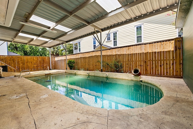view of pool with a fenced in pool, a patio, and a fenced backyard