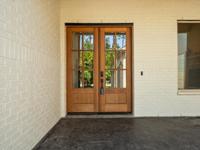 entrance to property featuring french doors