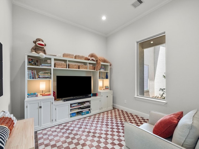 living room with ornamental molding, recessed lighting, visible vents, and baseboards