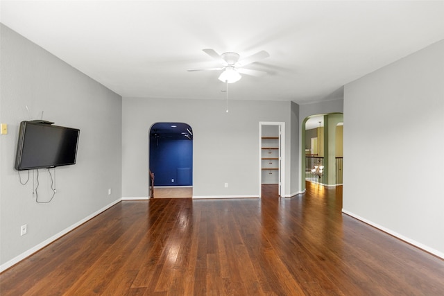 unfurnished living room with ceiling fan and wood-type flooring