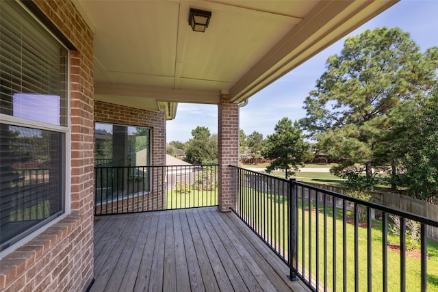 deck featuring a lawn