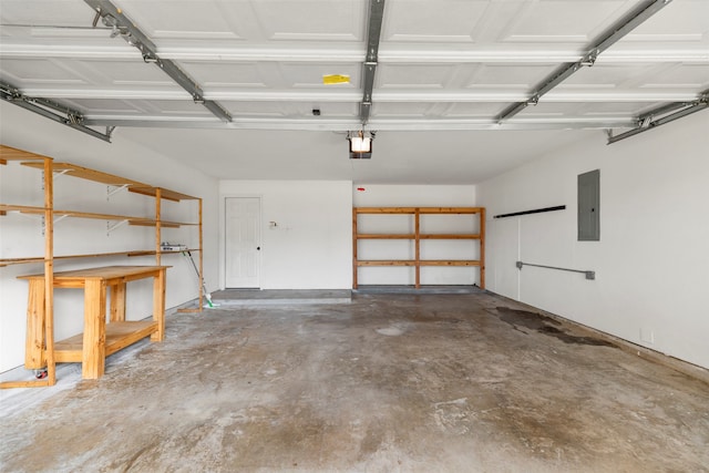 garage featuring a garage door opener and electric panel