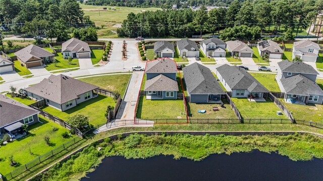 aerial view with a residential view and a water view