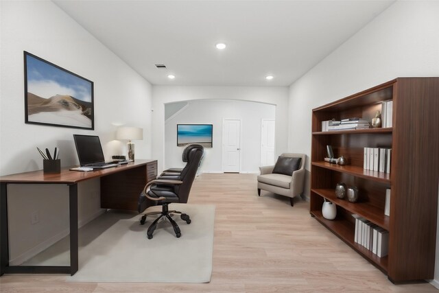 home office with light wood finished floors, visible vents, and recessed lighting