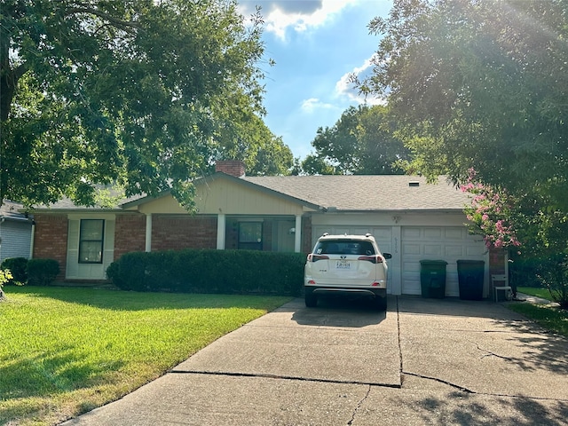 single story home featuring a front lawn and a garage