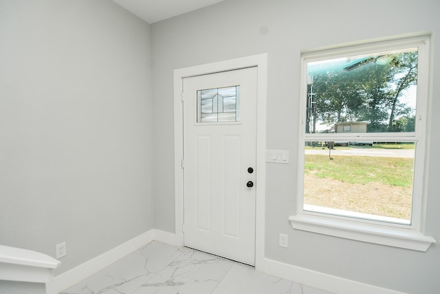 entrance foyer with light tile patterned floors