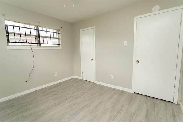 empty room featuring light hardwood / wood-style floors