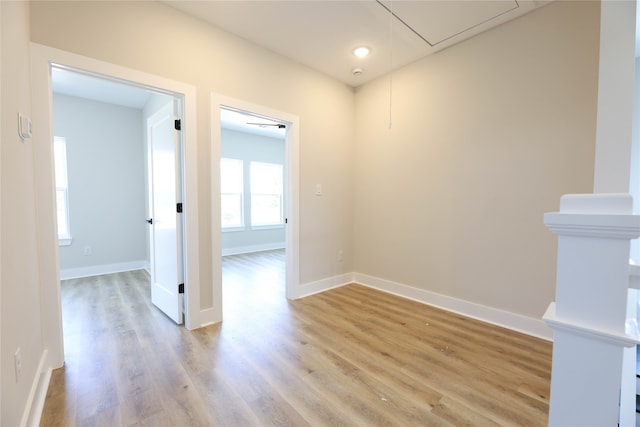 spare room featuring light wood-type flooring