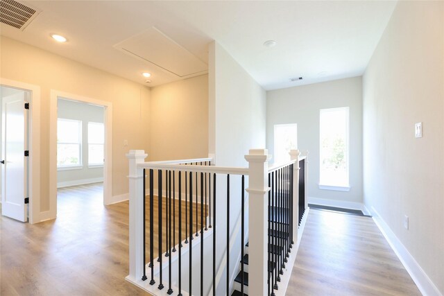 hall with light wood-type flooring