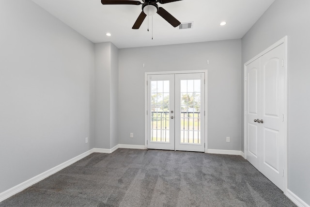 empty room with carpet flooring, ceiling fan, and french doors