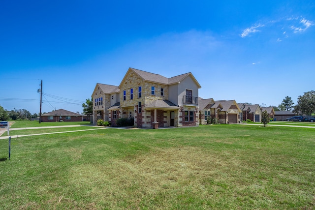 view of front of property featuring a front lawn