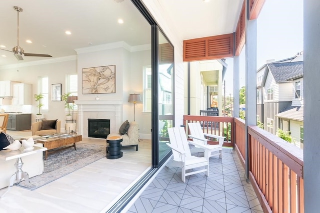 balcony featuring ceiling fan