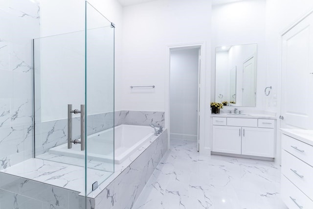 bathroom featuring tile patterned floors, separate shower and tub, and vanity