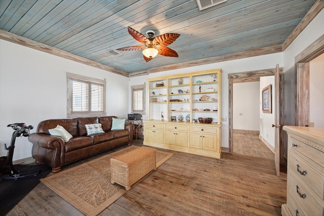 living room featuring light hardwood / wood-style floors, wooden ceiling, ornamental molding, and ceiling fan