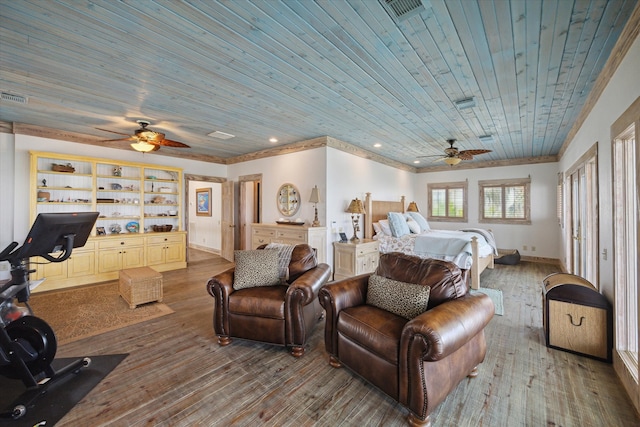 bedroom featuring ceiling fan, wood-type flooring, and wooden ceiling