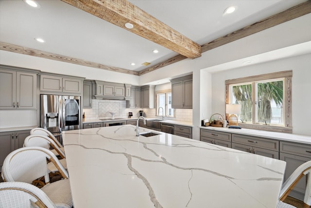 kitchen featuring backsplash, appliances with stainless steel finishes, recessed lighting, and gray cabinetry