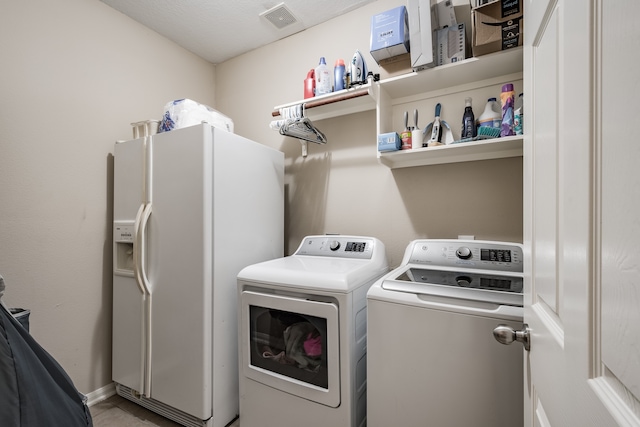 laundry area featuring washer and clothes dryer