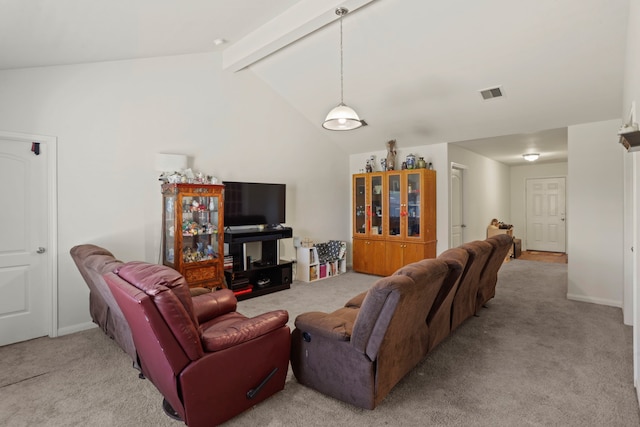 living room with lofted ceiling with beams and light colored carpet