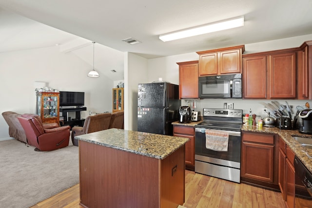 kitchen featuring a kitchen island, light carpet, stone counters, black appliances, and lofted ceiling with beams