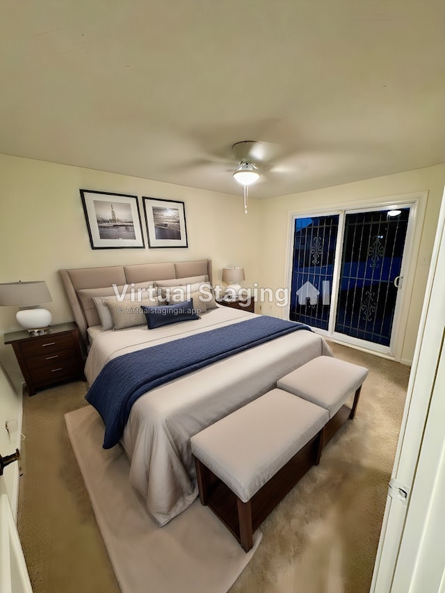 carpeted bedroom featuring ceiling fan