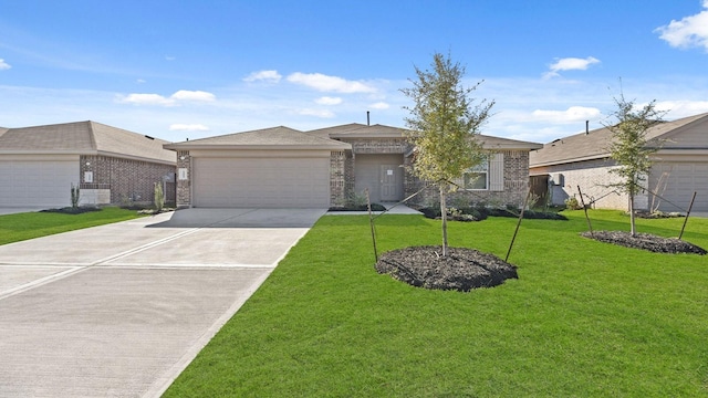 ranch-style house featuring a garage and a front lawn