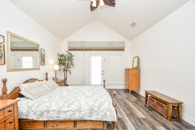 bedroom featuring ceiling fan, hardwood / wood-style floors, and high vaulted ceiling