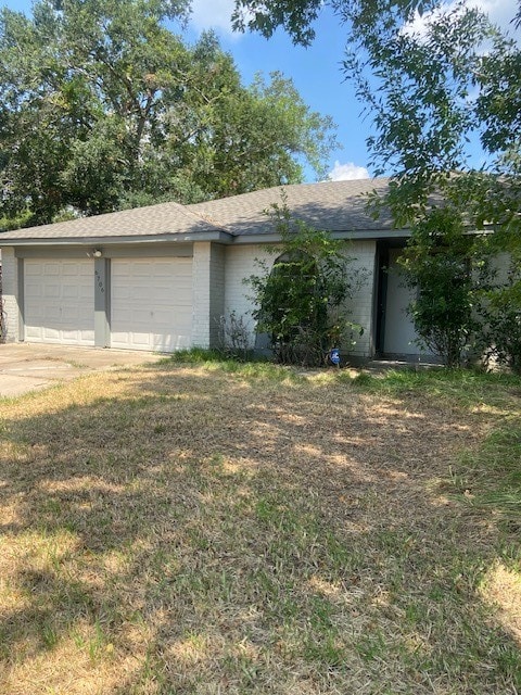 view of side of home featuring a garage