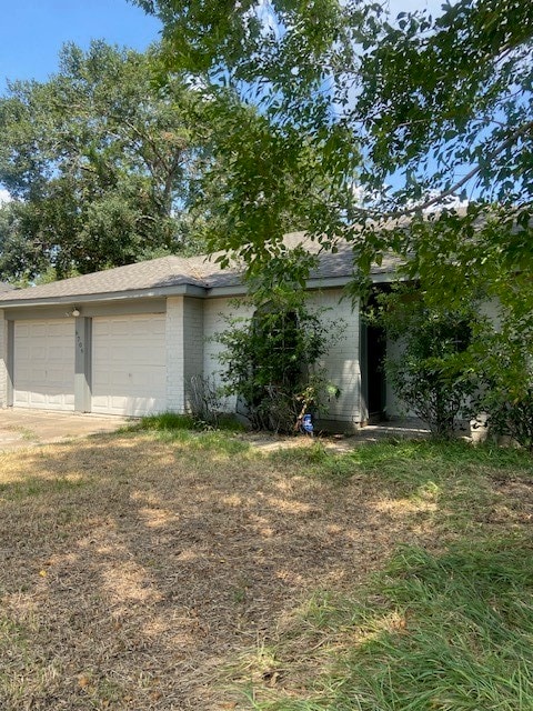 view of property exterior with a garage