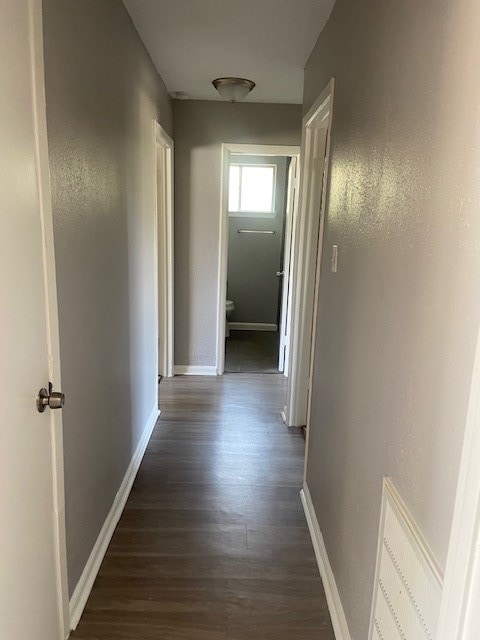 hallway featuring hardwood / wood-style floors