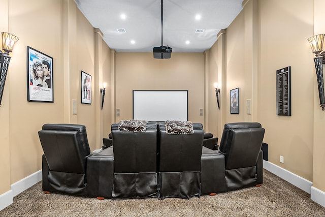 cinema featuring visible vents, carpet floors, and baseboards