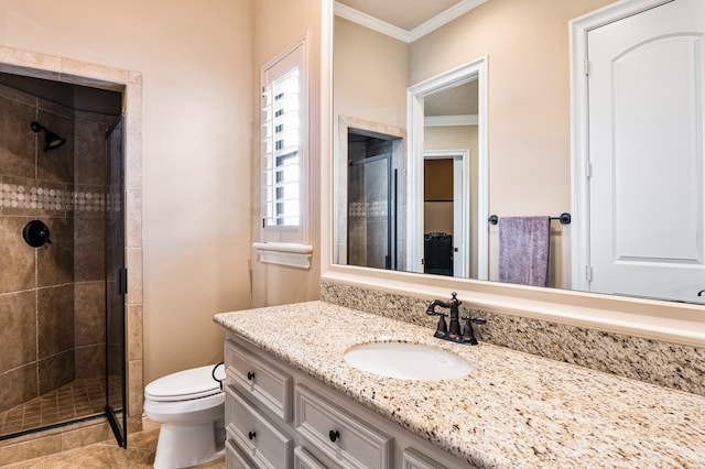 full bathroom featuring toilet, a stall shower, crown molding, tile patterned flooring, and vanity