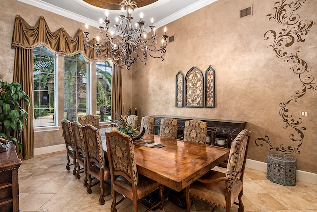 dining space featuring visible vents, a healthy amount of sunlight, ornamental molding, and an inviting chandelier