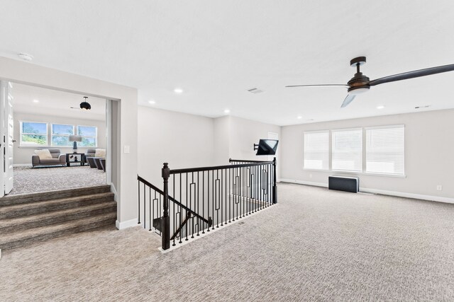 hallway featuring carpet floors