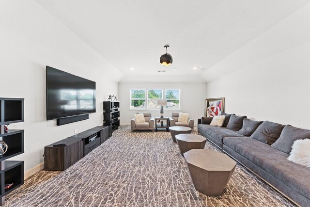 living room with vaulted ceiling