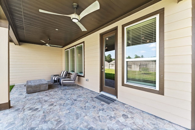 view of patio / terrace featuring ceiling fan