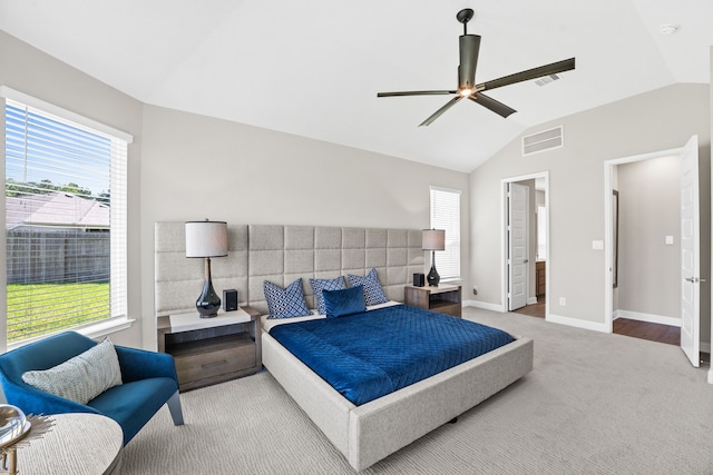 bedroom featuring visible vents, baseboards, carpet, and lofted ceiling