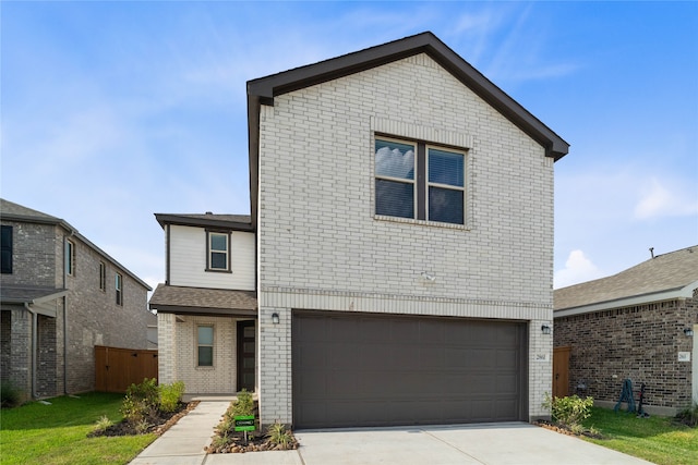 front of property with a garage