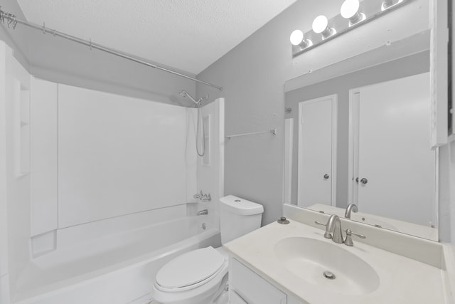 full bathroom featuring a textured ceiling, toilet, shower / bathing tub combination, and vanity