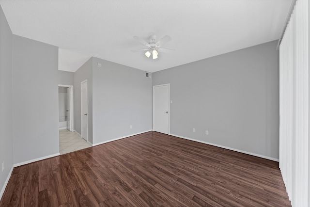 unfurnished room featuring ceiling fan and wood-type flooring