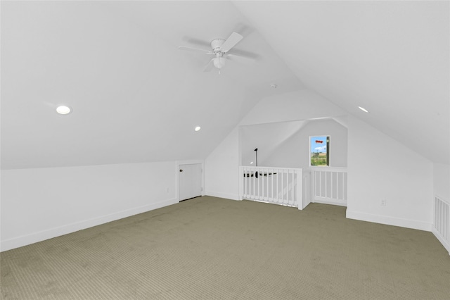 bonus room featuring carpet floors, ceiling fan, baseboards, and lofted ceiling