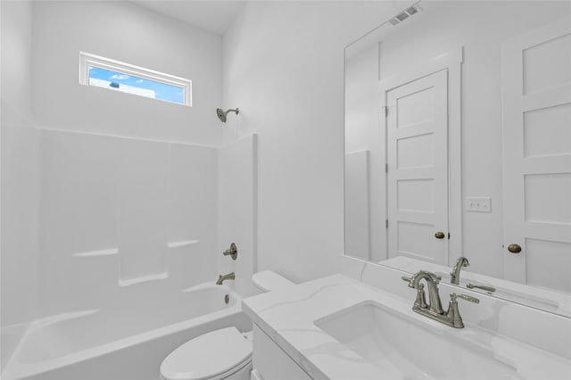 full bathroom with vanity, tub / shower combination, and toilet