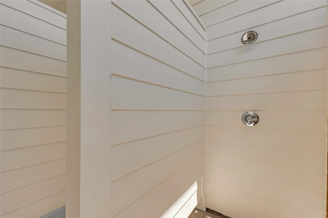 bathroom with tiled shower