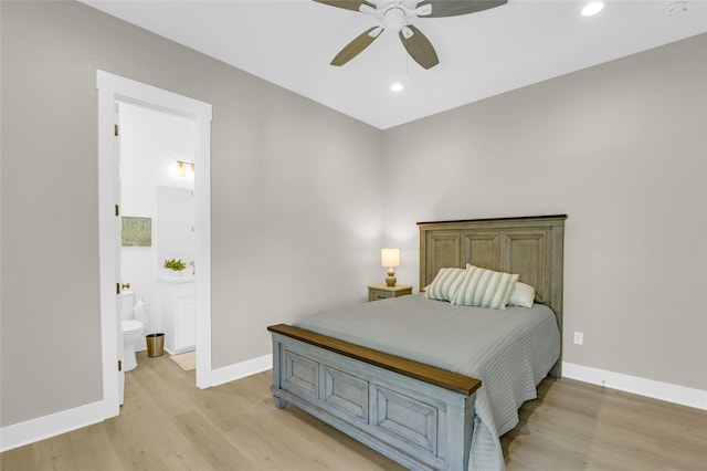 975 Alberdie Dr, Crystal Beach, TX 77650 - bedroom featuring light wood finished floors, baseboards, recessed lighting, connected bathroom, and ceiling fan