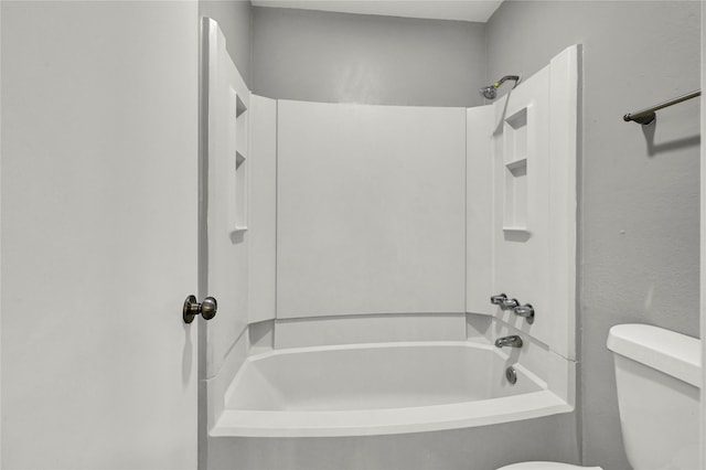 bathroom featuring toilet and shower / bath combination